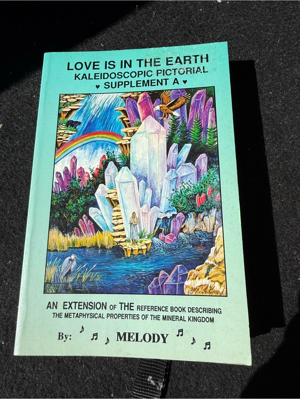 Love Is in the Earth Kaleidoscopic Pictorial Supplement A - Light Teal Cover